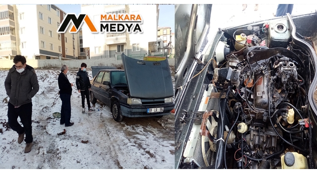 Malkara'da yanan otomobilini kumla söndürdü