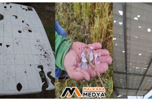 Ceviz büyüklüğünde yağan dolu tenteyi ve masayı delip geçti