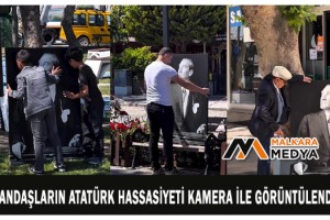 Vatandaşların Atatürk hassasiyeti kamera ile görüntülendi... İki çocuk Atatürk portresini düzelttikten sonra öptü